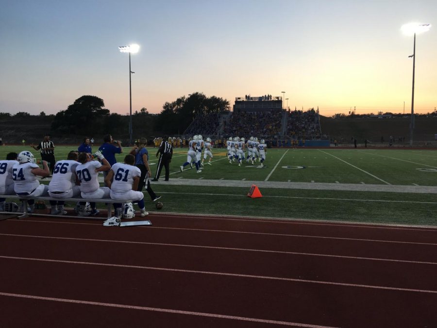 Football players take the field in the first quarter versus the Lago Vista Vikings.  