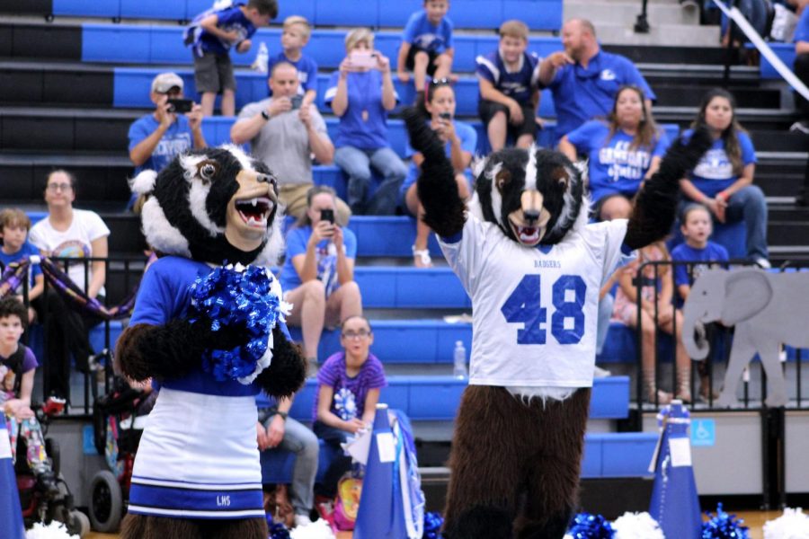 Bailey+Badger+and+Buster+Badger+cheer+for+the+football+team+during+the+homecoming+pep+rally.++The+teams+will+play+Gatesville+tonight+and+tomorrow.+