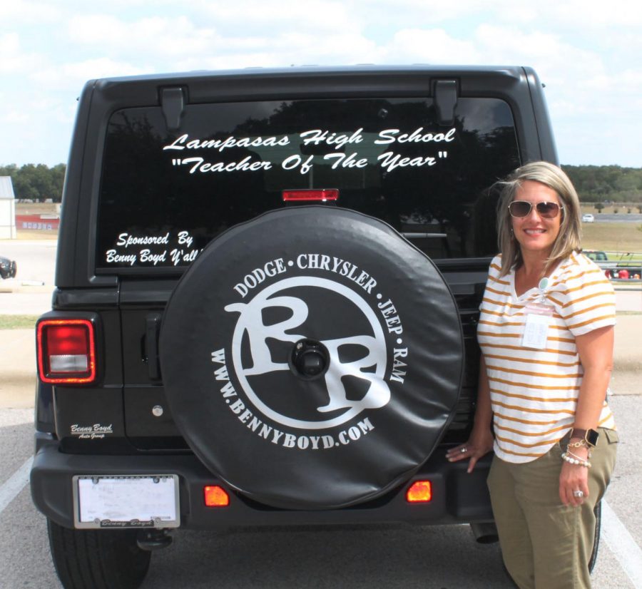 Kalin Wells, who was one of the teachers of the year, received a Jeep from Benny Boyd to drive for one month. 