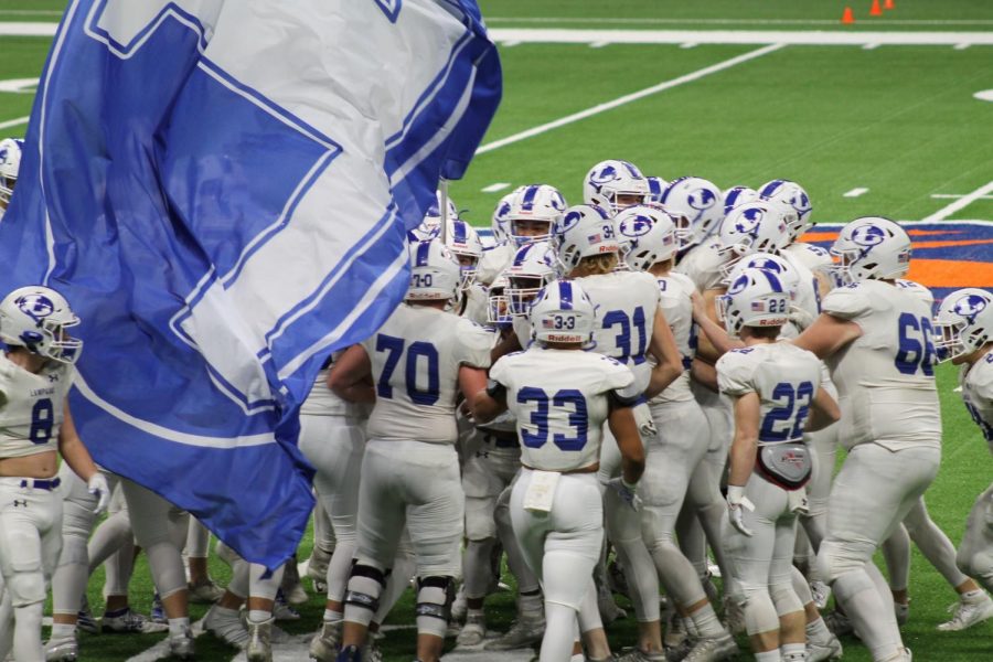 The football team huddles to get pumped up before the Needville game on Nov. 30. The team will play the Liberty Hill Panthers tomorrow at 2:00 p.m.