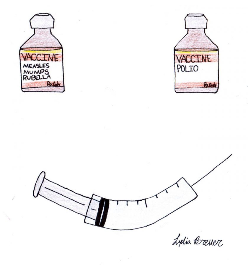 Two vaccination vials and a syringe form the shape of a smiley face, because getting vaccinated is important for the well being of the human race.