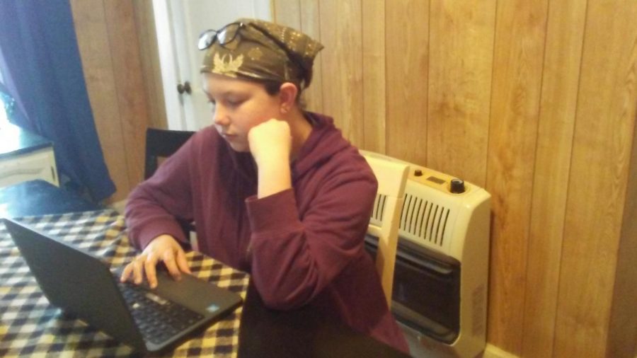 Seventh grade student Aerilyn Garner finishes science classwork from home. For your mental health, it is important to take time for hobbies you enjoy after finishing work everyday. 