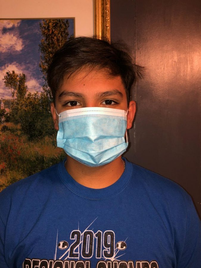 Eighth grade student Benjamin Ybarra wears a mask.Young people and old people alike need to take heed to health officials’ advice and just simply stay home, stay safe and help health care providers by slowing the spread.