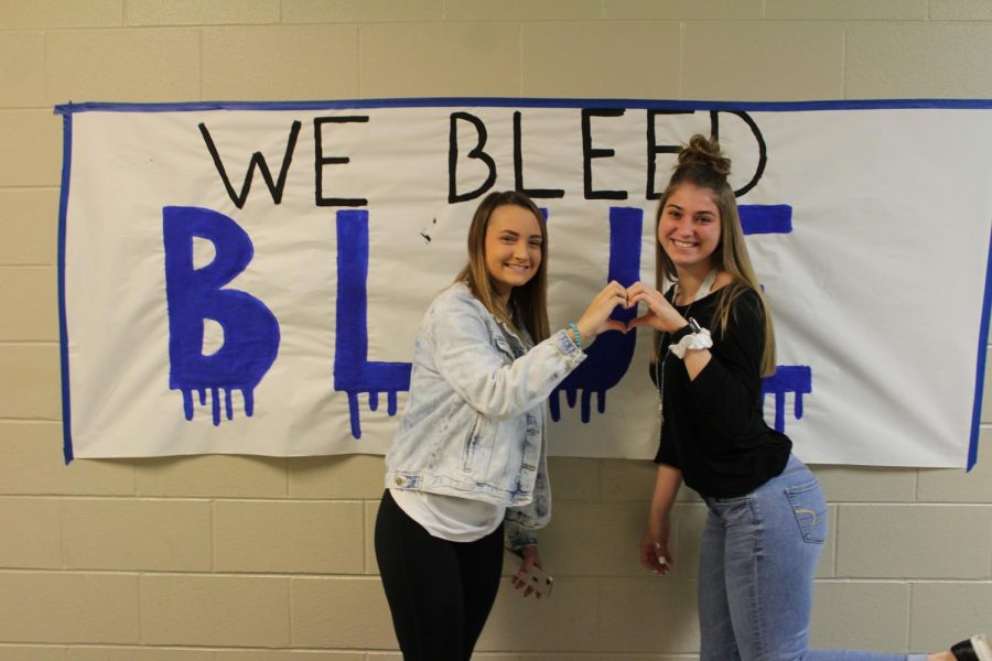 Senior Emma Cornish and junior Brooke Edgar (early graduate) celebrate the end of their final volleyball season in October 2019. Cornishs senior track season would end much sooner than expected in March 2020 due to COVID-19.