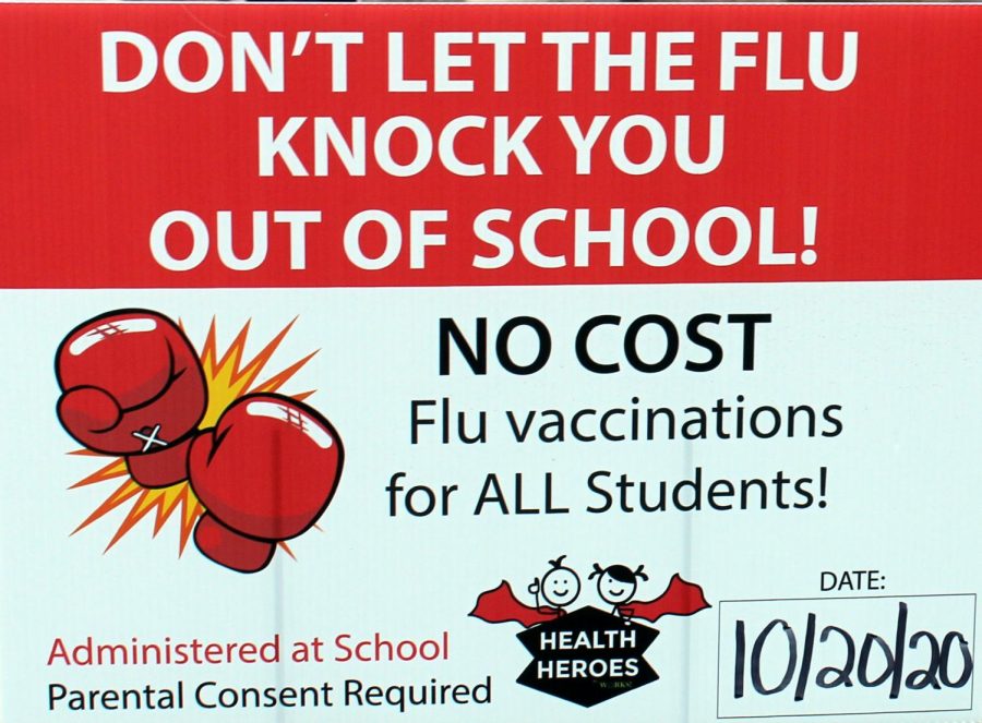 This is the sign at the front of the school advertising the flu shot. The date has now been changed to Nov. 4.