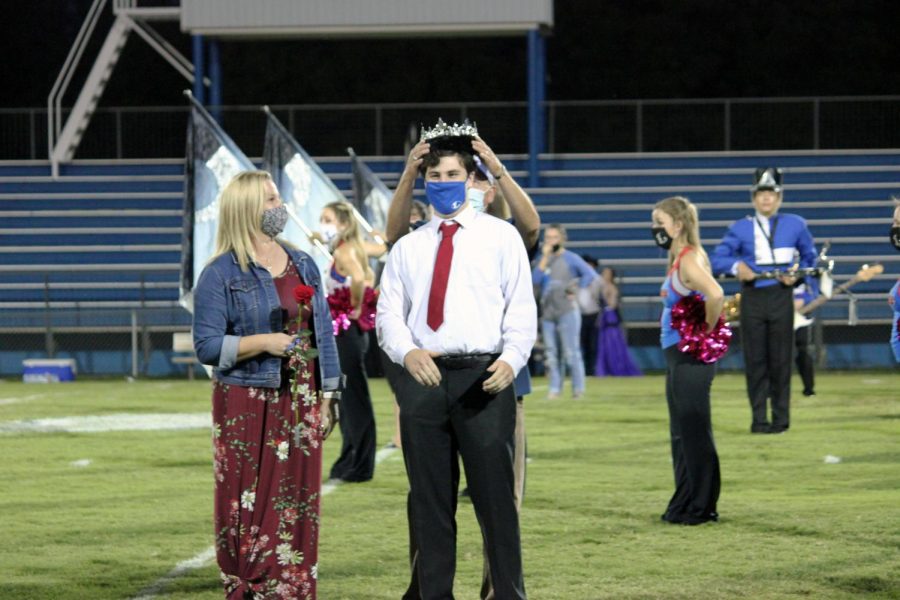 Senior Cole Wheeler gets crowned homecoming king.