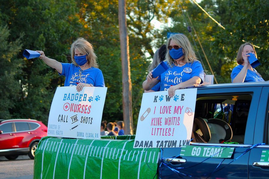 District nurse Donna Clark and Kline Whitis Elementary nurse Dana Tatum ride in the homecoming parade Oct 21. 