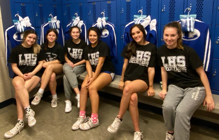 Cheerleaders receive new uniforms before heading to UIL State.  They will compete in-person for the first time this school year. 