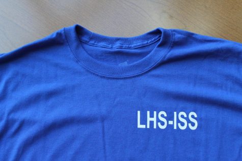 The school implemented shirts and shorts for students to wear when deemed out of dress code. 