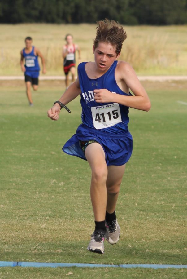Sophomore Kaleb Roberts crosses the finish line at the cross country meet Sept. 30.
