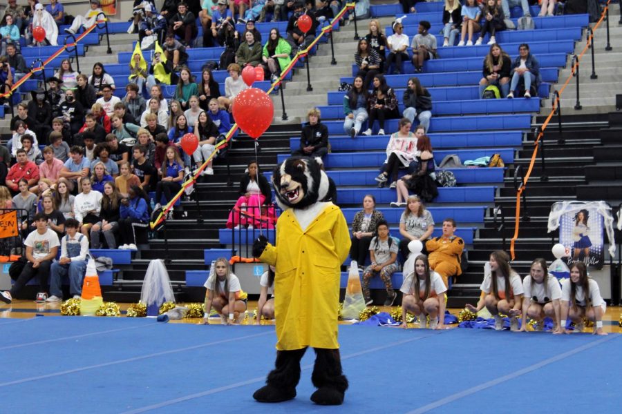 The Badger mascot introduces a routine performed by the cheer team at the pep rally Oct. 29.