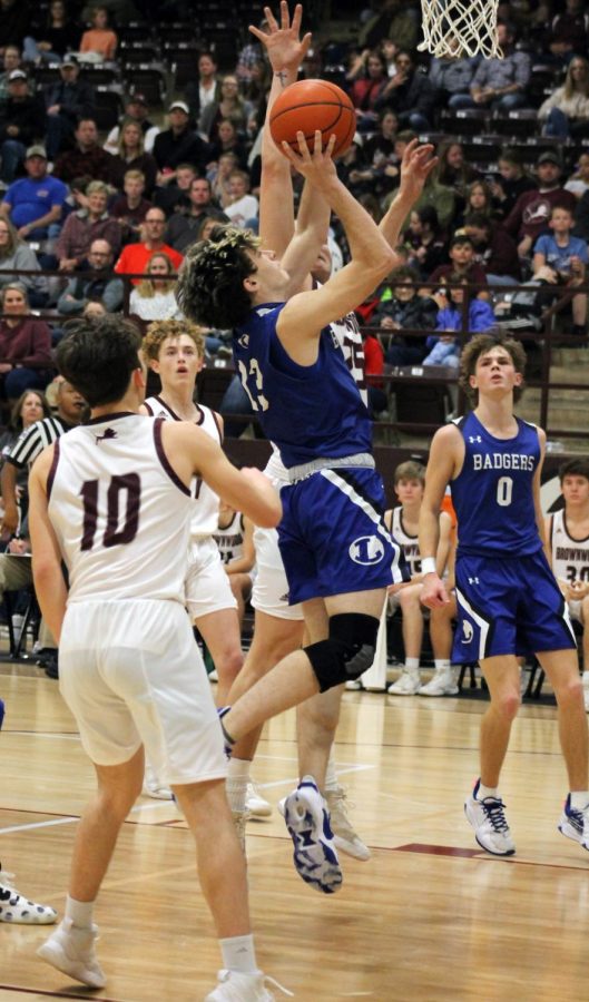 Senior Cort Howard goes for a contested layup against Brownwood Jan. 28. 