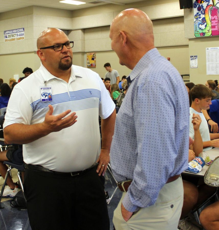 New Assistant Principal Ryan Race talks with Principal Joey McQueen during B Lunch yesterday.