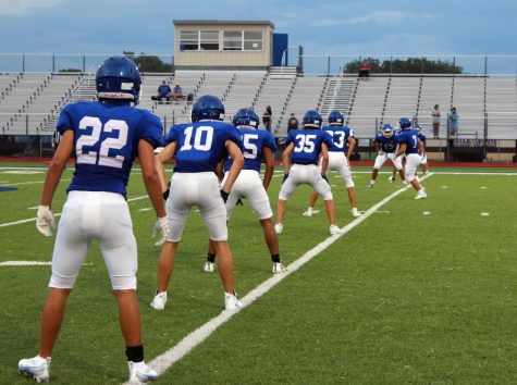 The JV football team kicks off during their game against North Houston Early College High School yesterday. The Badgers won the game 33-6.