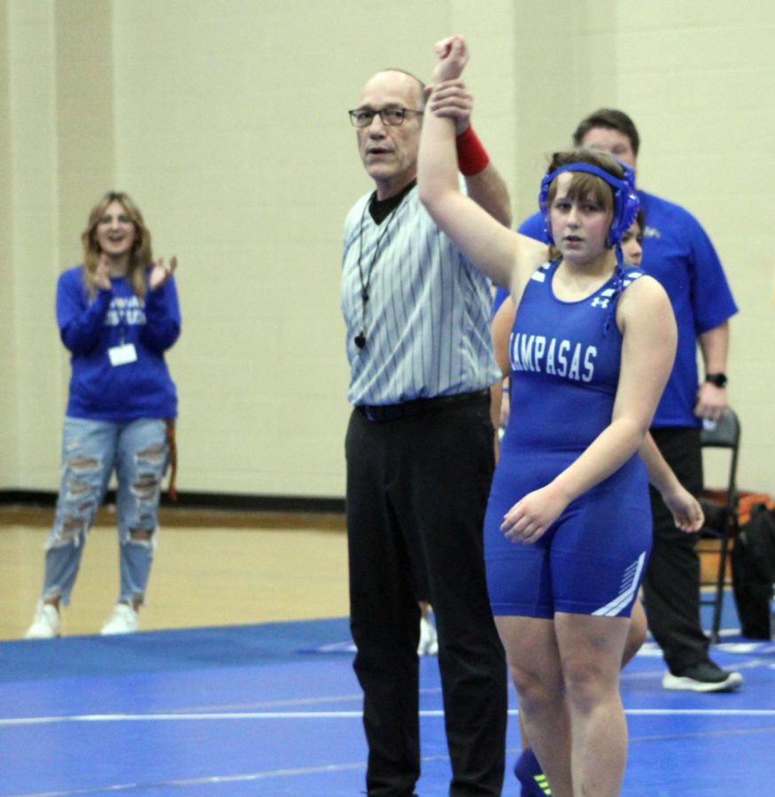 Sophomore Joey Roberts arm is raised after she wins her wrestling match Jan. 18.