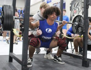 Junior Dailan Fagan competes at the home powerlifting meet Jan. 19.