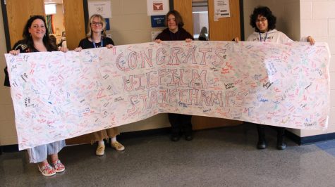 Students signed a banner to congratulate film coach Cathy Keuhne and her students that made it to and placed at state in UIL Film. 