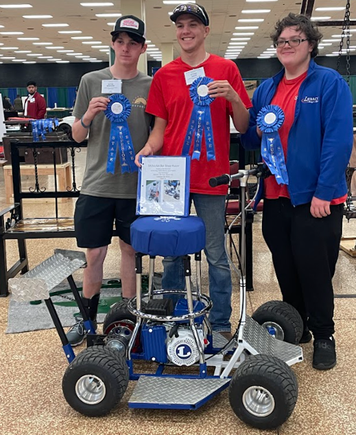 Sophomores Jayce Newkirk, Ethan Craig and Daniel Methanys barstool racer recieves a superior recognition.