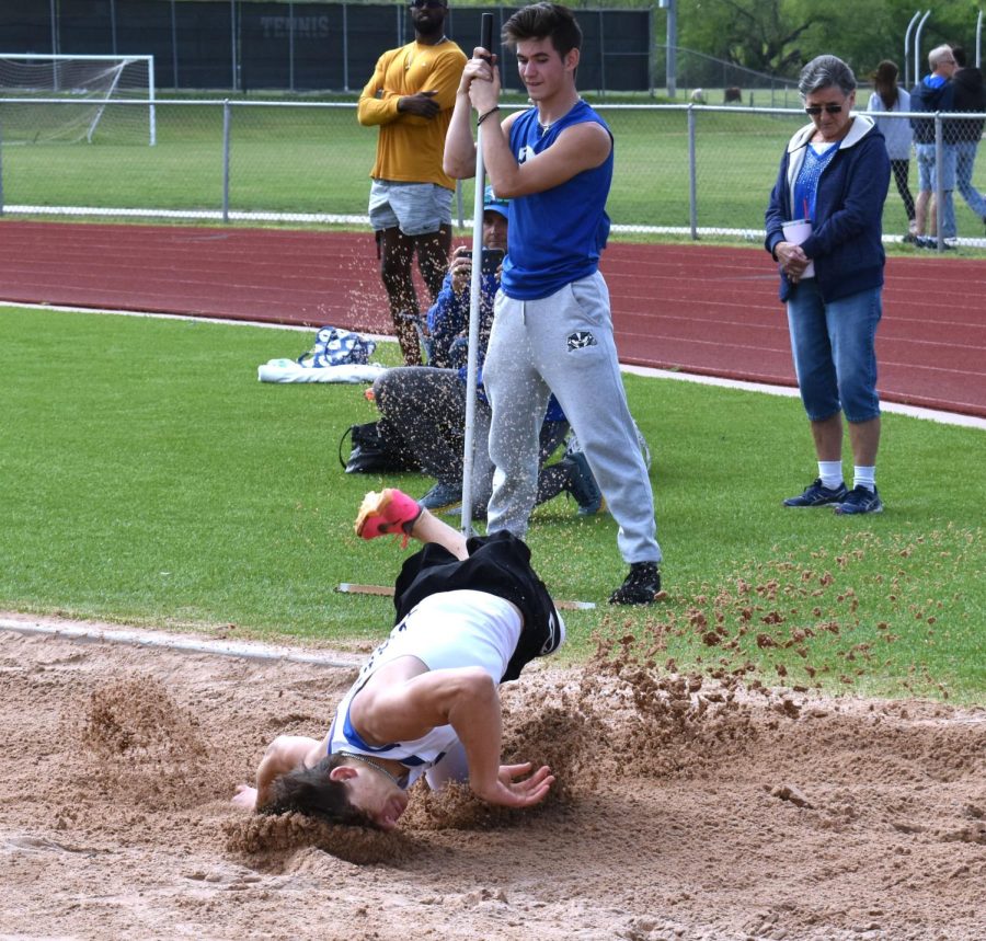 Junior Asa White competed in the varsity boys long jump competition at district and placed first, earning him a spot on the team going to area.