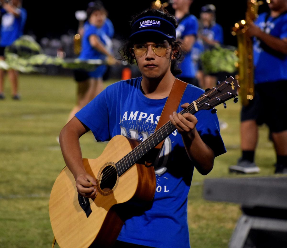Junior Bobby Renshaw performs during halftime Sept. 1.