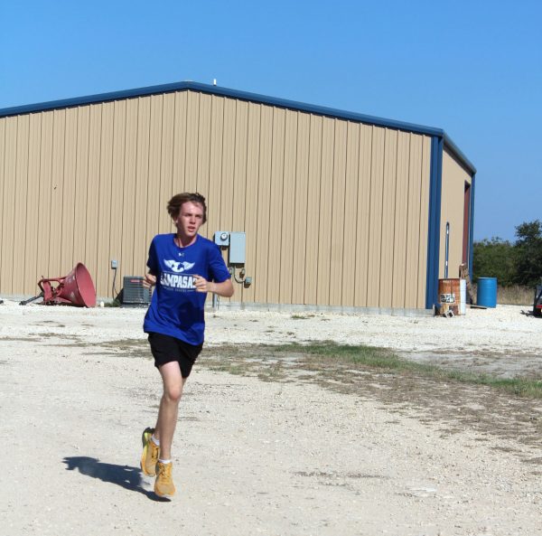 Junior Brayden Phillips jogs the 580 Sports Complex course the day before the Lampasas cross country meet. 