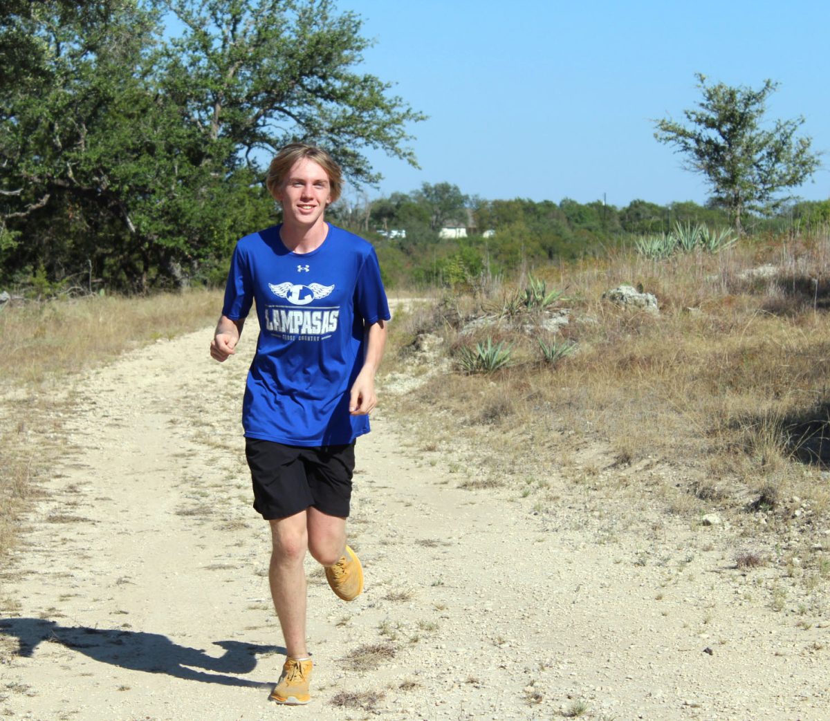Junior Brayden Phillips jogs the course at the 580 Sports Complex to practice for the Lampasas home meet. 