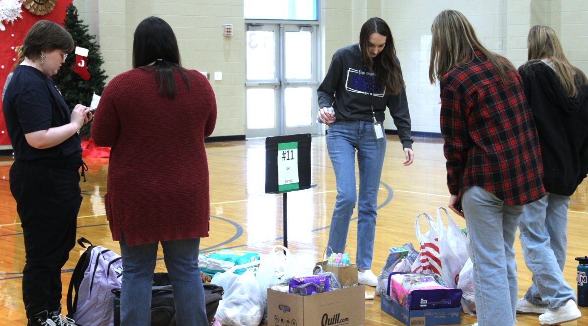 NHS organizes their Angel Tree gifts.