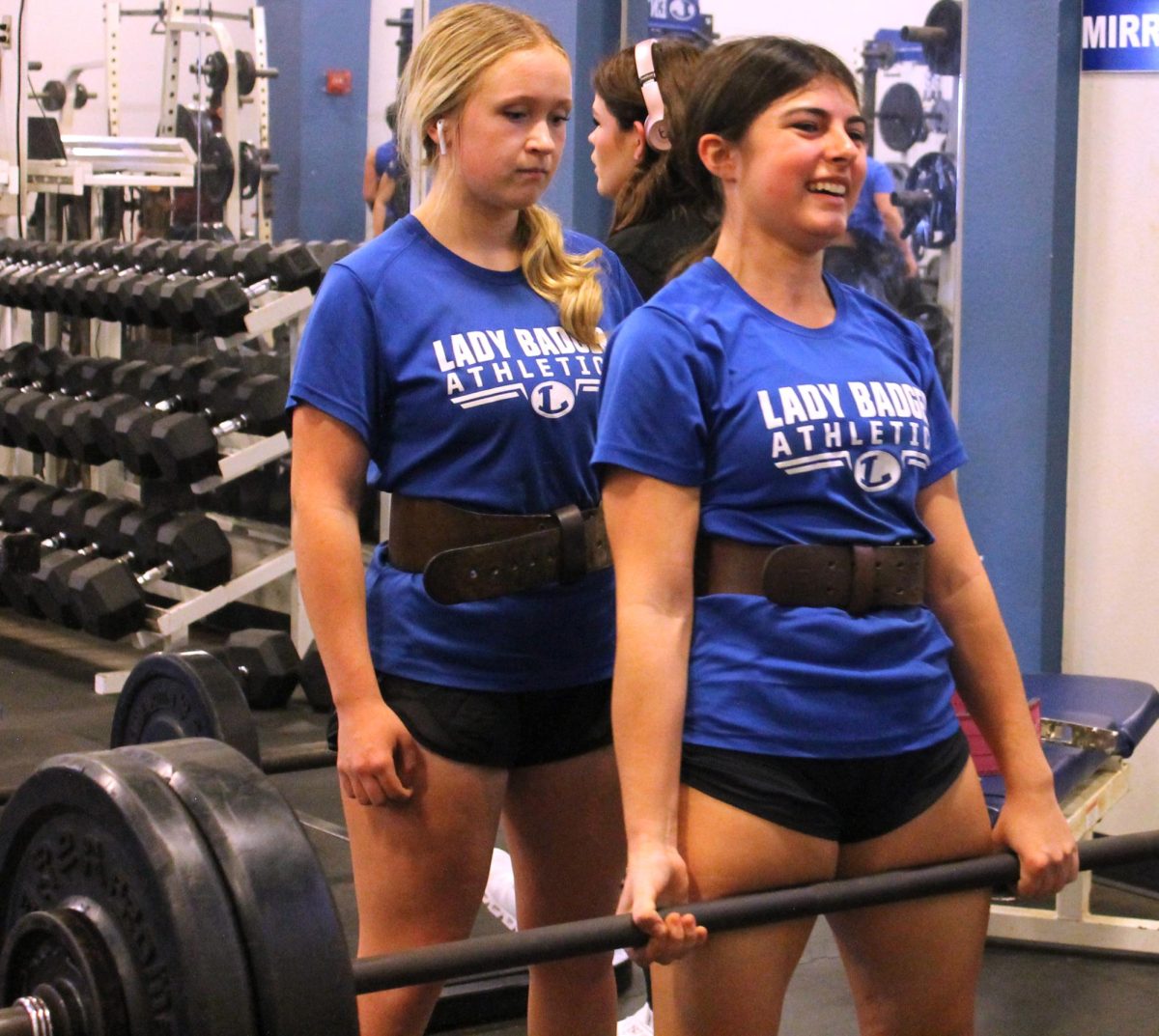 Members of the powerlifting team practice after school yesterday. 