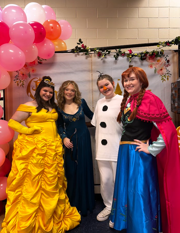 Sophomore Emberli Lindsey, freshman Raelynn Flowers, freshman Hartley Johnson, sophomore Samantha Sturgeon dressed as Disney characters for cosmetologys princess party fundraiser April 27. 