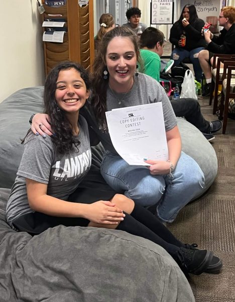 Sophomore Juliet Cardona and journalism coach Kayla Cain celebrate learning Cardona placed first at the regional meet at Stephen F. Austin University April 26. 