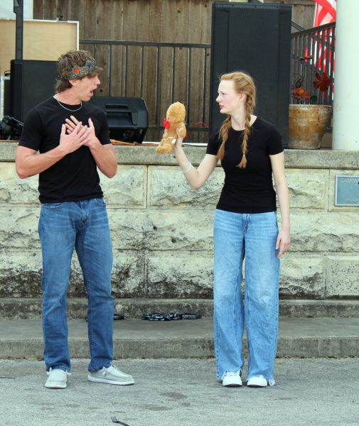 Cale Wheeler and Kenzie Stone perform as Lord Farquaad and Gingy from "Shrek The Musical" at Love Thy Neighbor in the square Oct. 5.