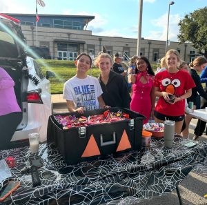 HOSA members with their trunk of candy