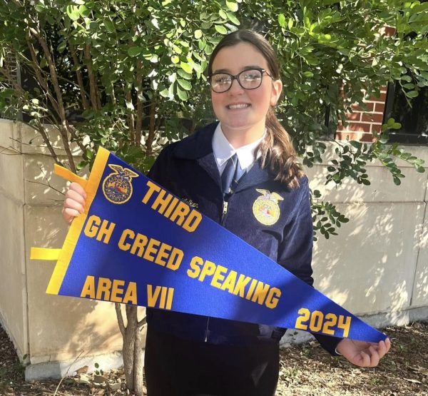 Freshman Leah Walker poses with her Greenhand Creed Speaking award competing in Kerrville Nov. 20.