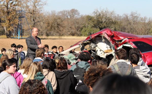 Students view the aftermath of Aspen's vehicle Dec. 2.