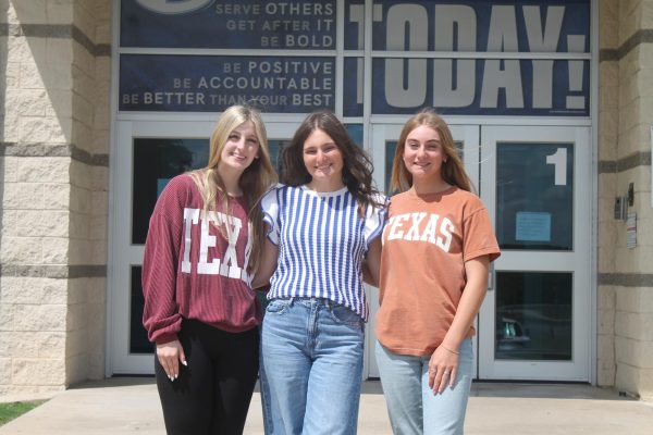 Seniors Meredith McBeth, Paige Rutland, and Loretta Hodges pose outside of LHS.