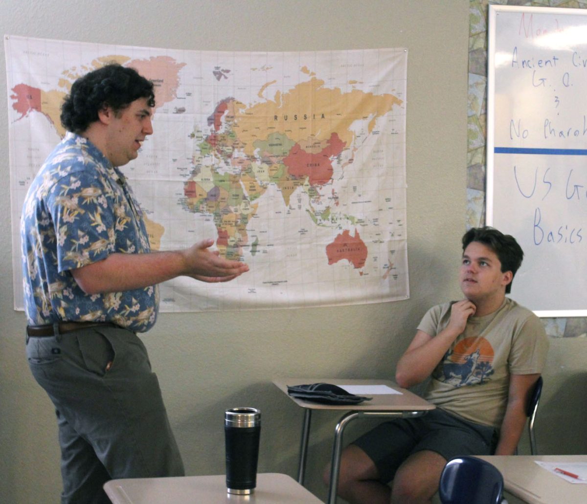 World history and public speaking teacher Cole Wheeler teaches during 3rd period Aug. 27.