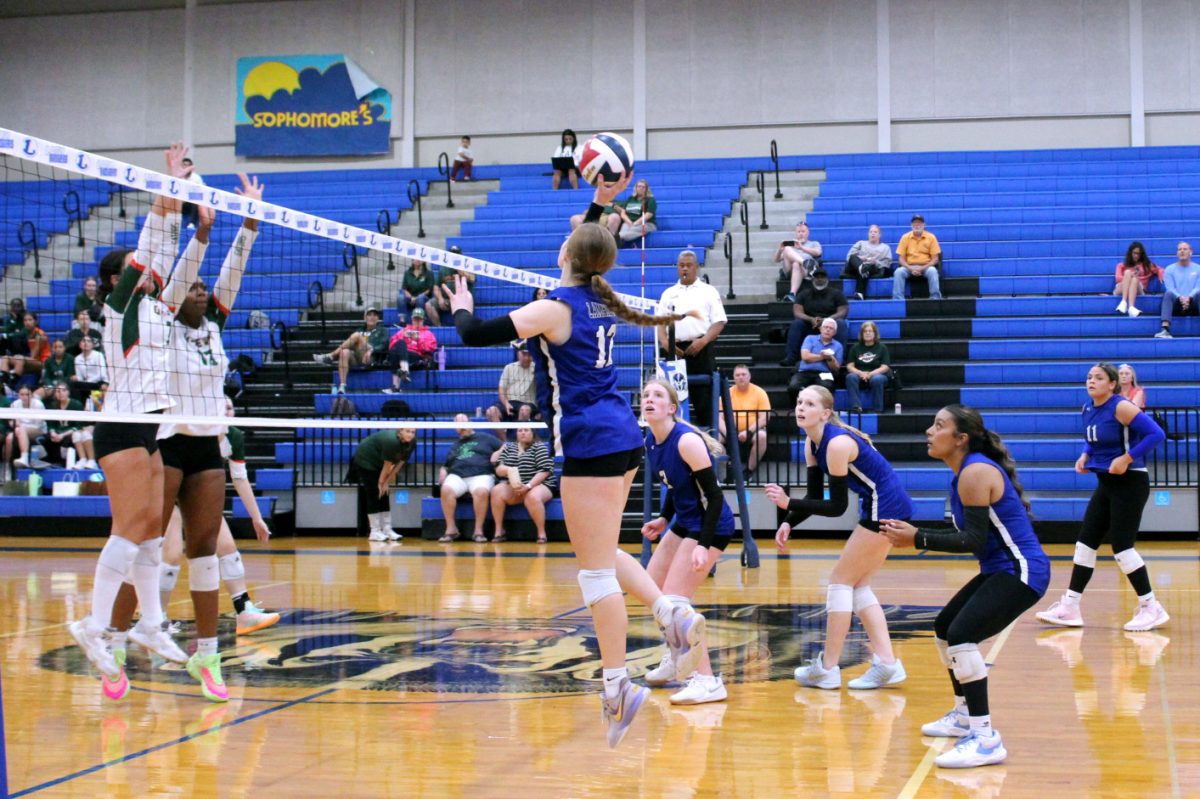 Volleyball team hustles to hit the ball during their game against Gateway on Sept. 19. 