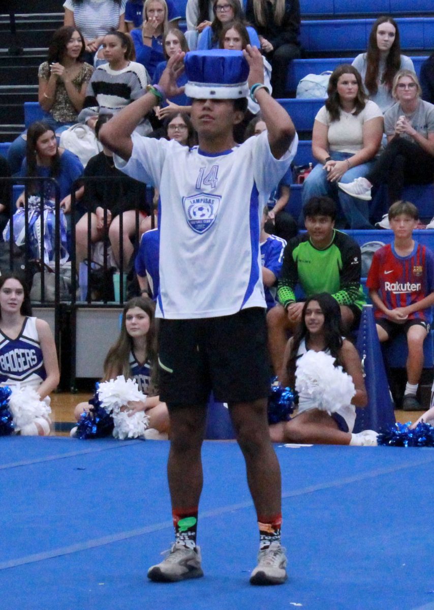 Senior Juan Rodriguez wears the crown after announced homecoming king at pep rally Sept. 26.
