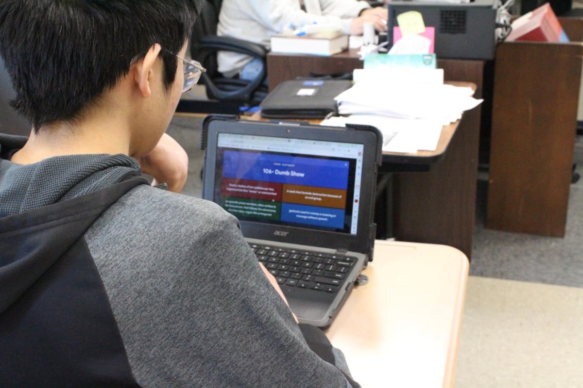 Senior Joshua Truong studies for Lit. Crit. 