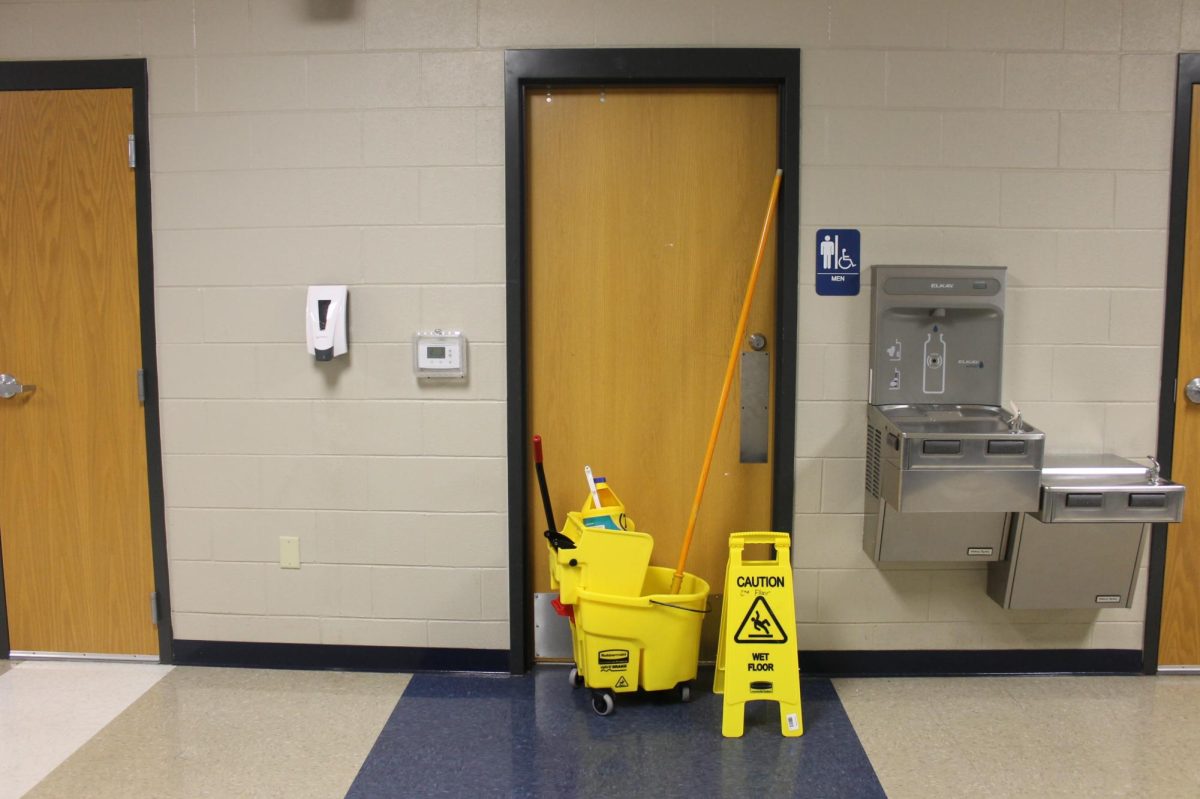 The upstairs boys restroom was locked after multiple repeated acts of vandalism. 